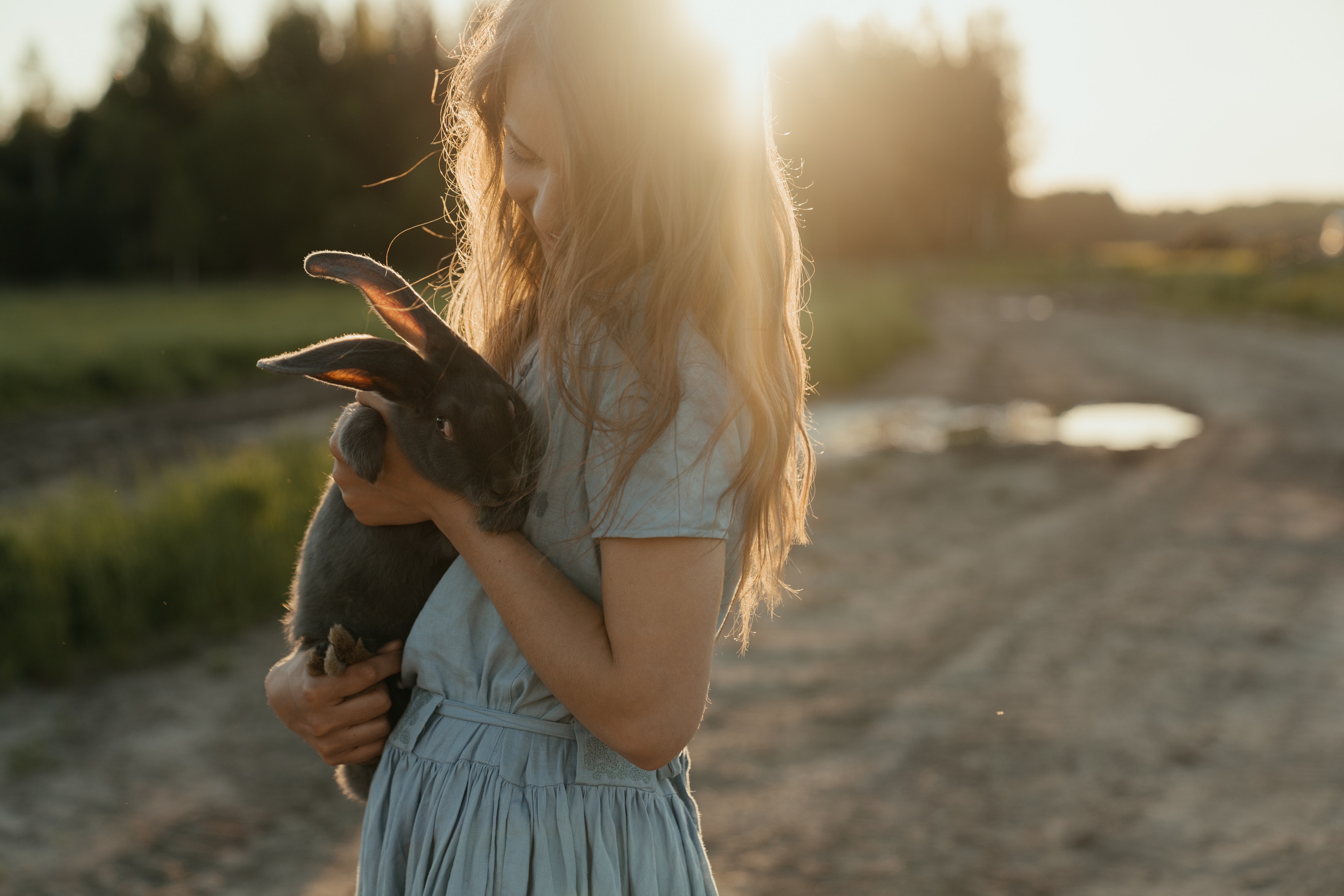 girl with pet rabbit